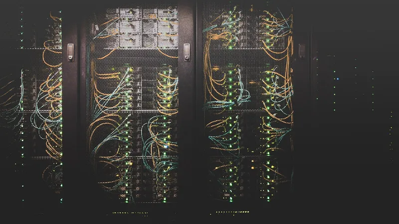 Rows of illuminated servers in a data centre